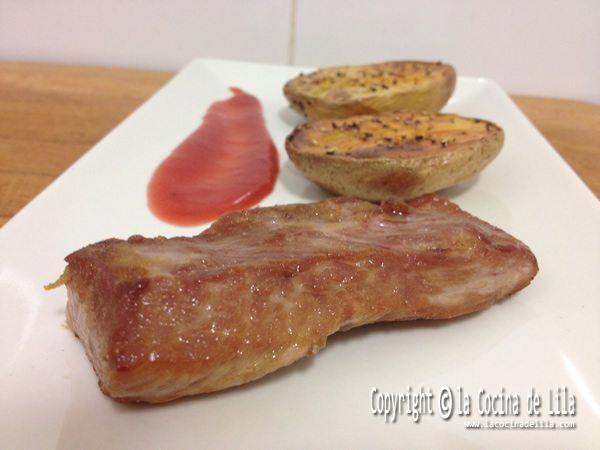 Secreto ibérico con coulis de frutos rojos